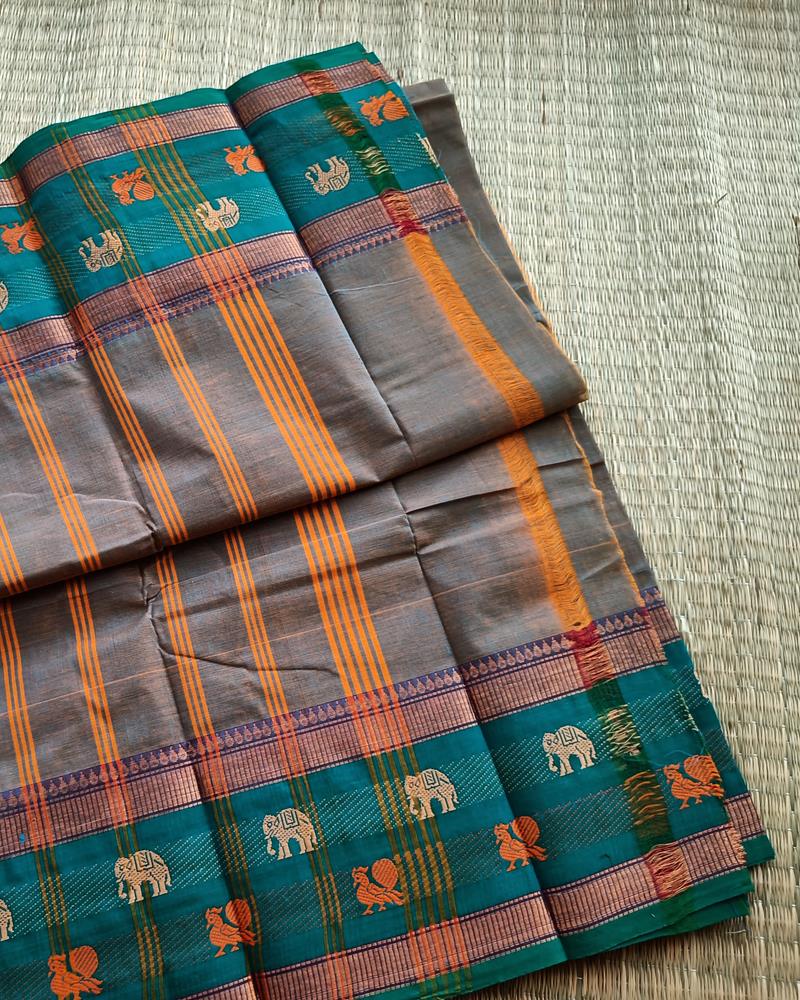 Chettinad Cotton |Shade of Ash with Teel Green Border with attractive Elephant Buttas